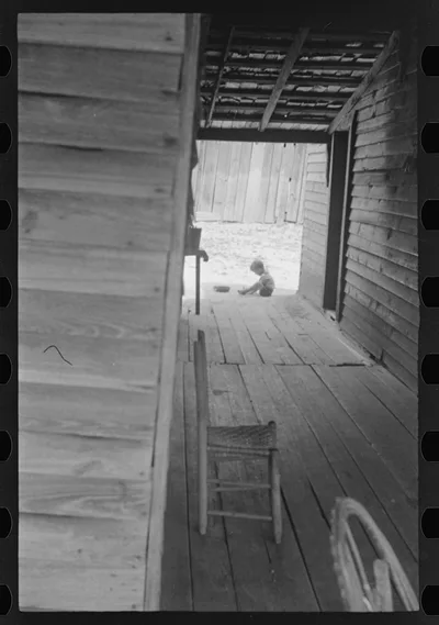 Dog run of Floyd Burroughs' home. Hale County, Alabama, 1936