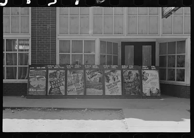 [Untitled photo, possibly related to: Movie poster, vicinity of…, Alabama, 1936