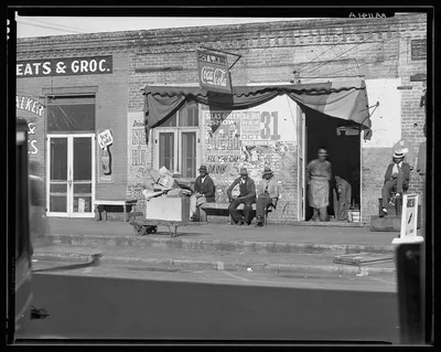 Sidewalk scene in Selma, Alabama, 1935