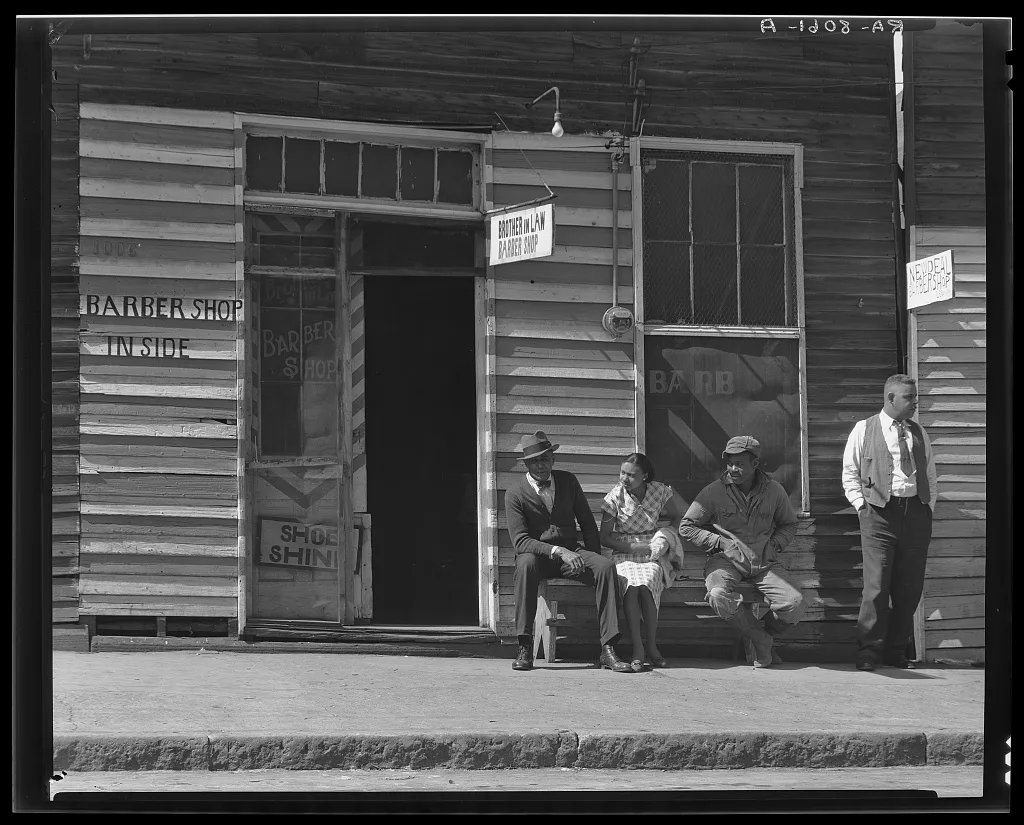 Vicksburg Negroes and shop front. Mississippi, 1936