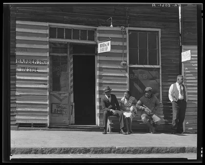 Vicksburg Negroes and shop front. Mississippi, 1936