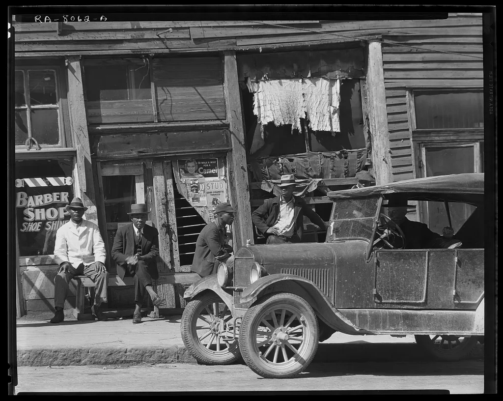 Vicksburg Negroes and shop front. Mississippi, 1936