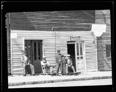 Vicksburg Negroes and shop front. Mississippi, 1936