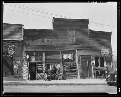 Vicksburg Negroes and shop fronts. Mississippi, 1936