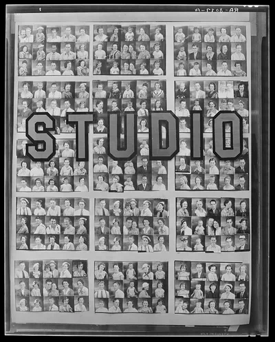 Photographer's window of penny portraits. Birmingham, Alabama, 1936