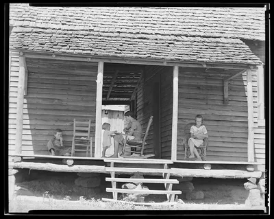 Front porch of the Burroughs' home. Hale County, Alabama, 1936