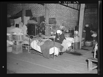 Sick flood refugee in the Red Cross temporary infirmary at Forrest…, Arkansas, 1937