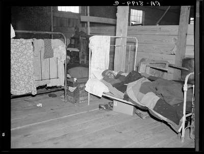 Sick flood refugee in the Red Cross temporary infirmary at Forrest…, Arkansas, 1937