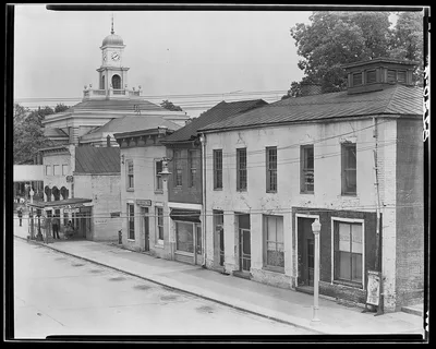 Greensboro, Alabama. Main street buildings and county courthouse…, 1936